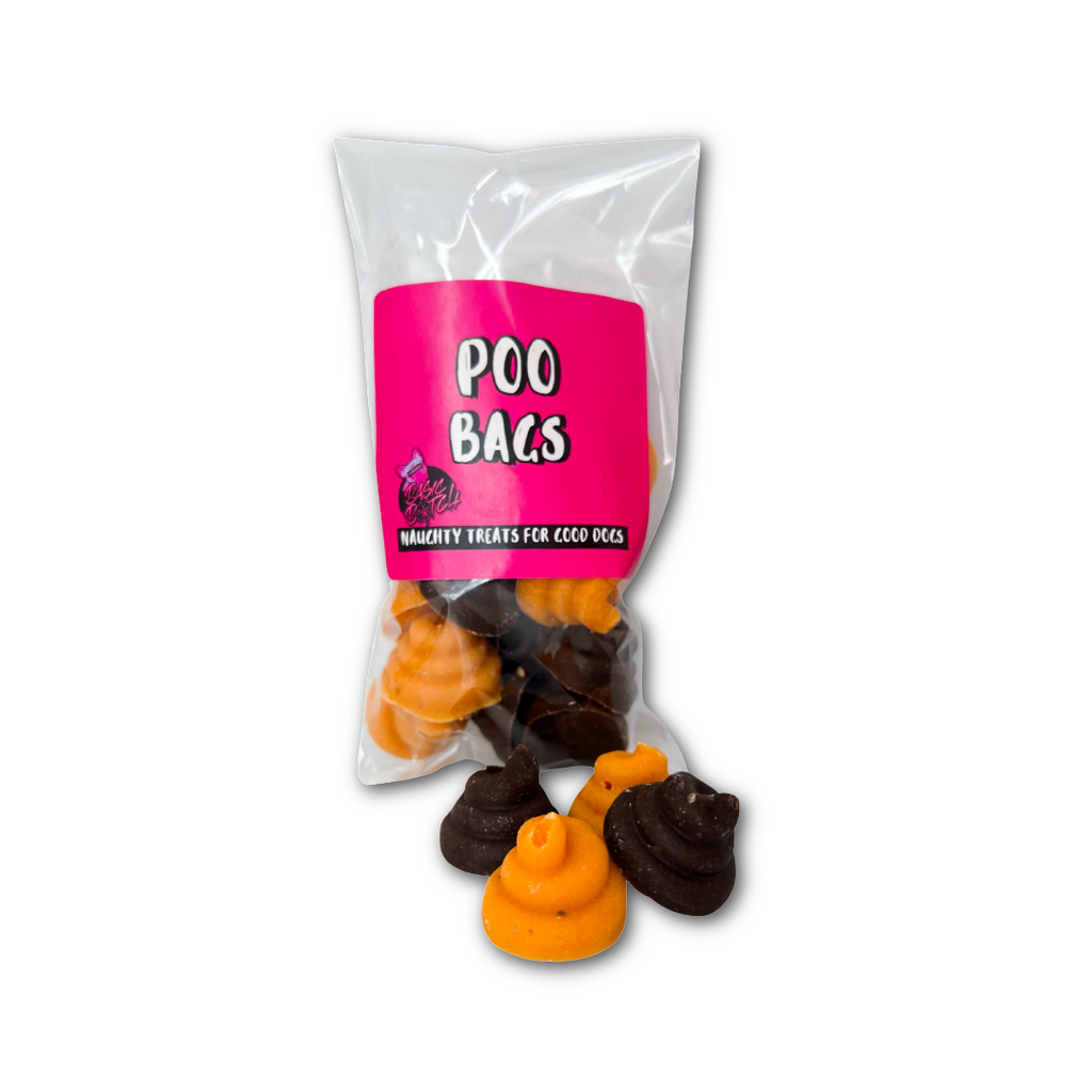 Packaged dog treats resembling mini dog turds, with 'Poo Bags' written in white on a pink sticker. 4 mini chocolate turds are outside of the package. On a white background.