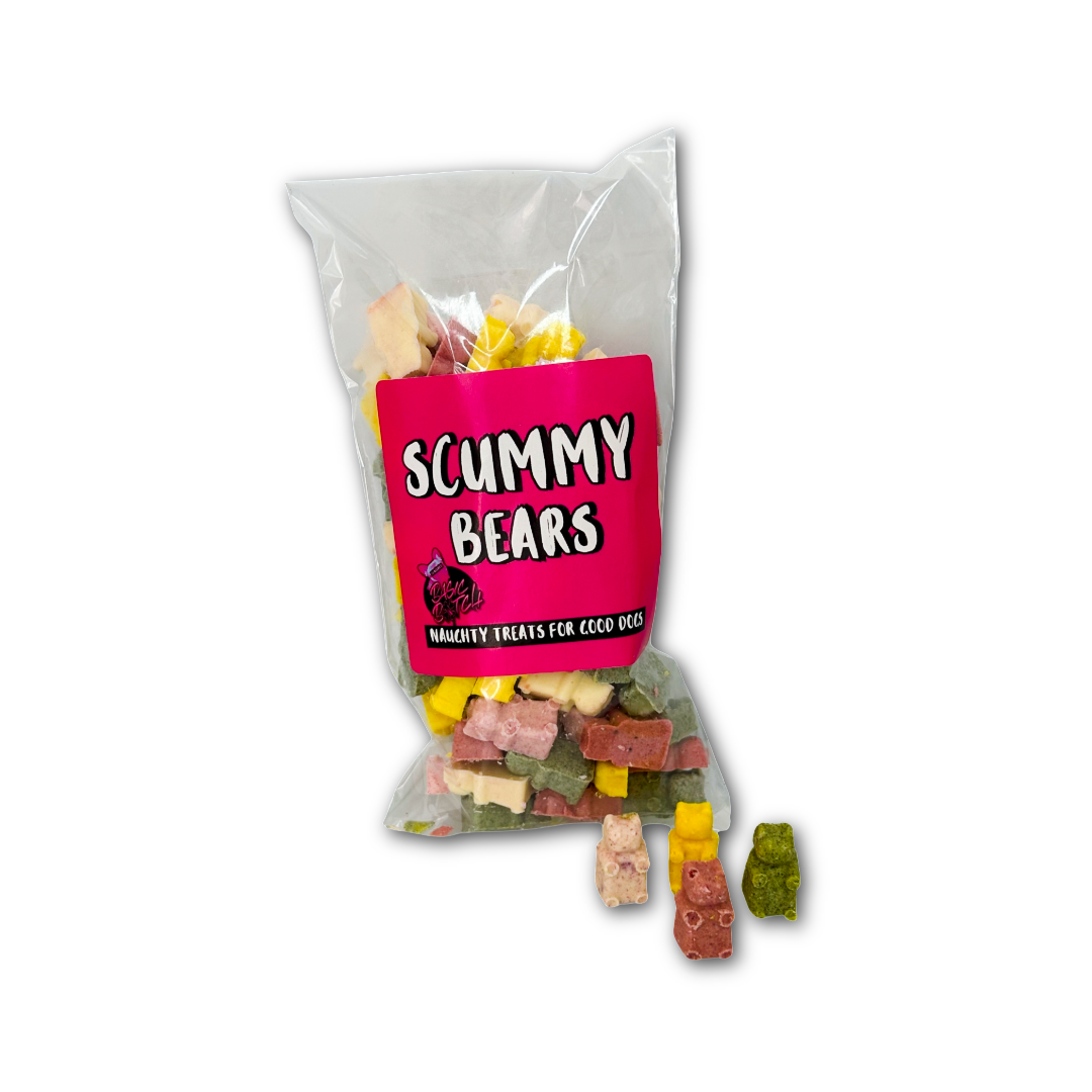 Bag of colourful chocolate mini bears labelled 'Scummy Bears' in white writing on a pink sticker, on a white background.